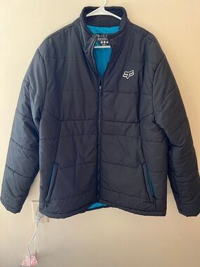 Fox Men's Black Puffer Jacket with Blue Trim